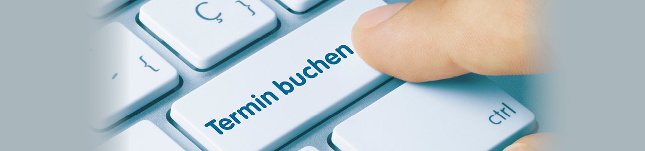 Tastatur mit einer Taste "Termin buchen"
