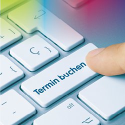 Tastatur mit einer Taste "Termin buchen"